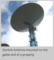 Starlink Antenna mounted on the  gable end of a property